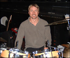 Drummer Ron Briggs in front of his drumset